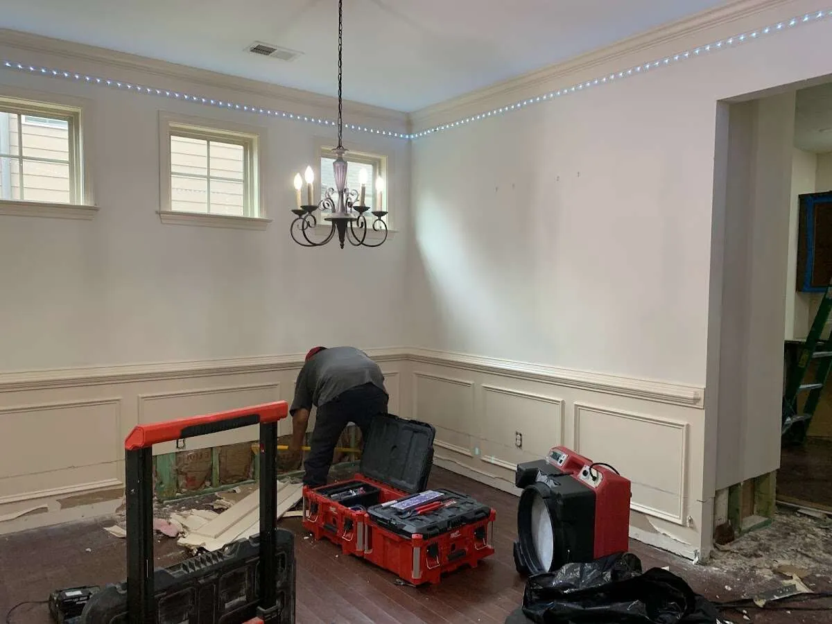 Restoration technician with professional equipment in Avondale